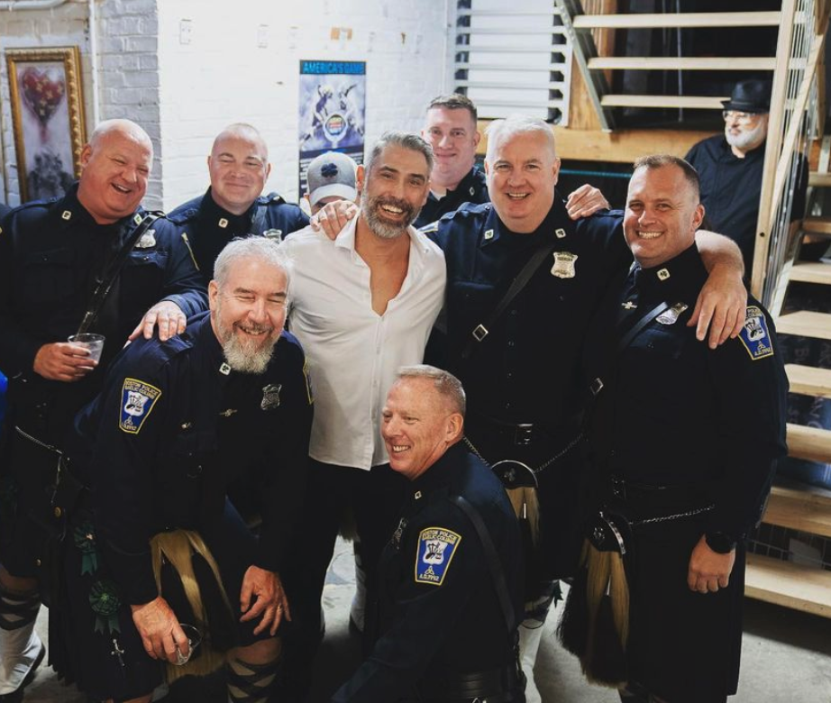 Retired Navy Seal and Community First Founder, Andrew Sullivan with the Boston Police Bagpipers